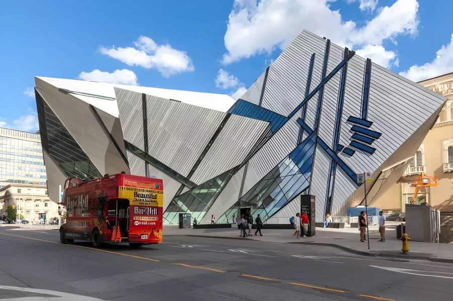 Ultimate 3-Day Toronto Itinerary: A Detailed Travel Guide 4 Royal Ontario Museum Modern architecture with a red bus