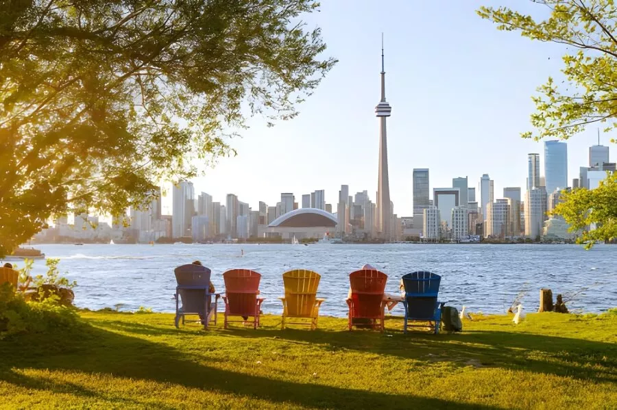 Ultimate 3-Day Toronto Itinerary: A Detailed Travel Guide 7 Colorful chairs overlooking Toronto skyline